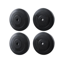 Set of four black barbell weight plates, two 5kg and two 10kg, on white background