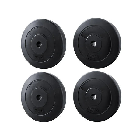 Set of four black barbell weight plates, two 5kg and two 10kg, on white background