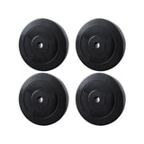 Set of four black 10kg weight plates for gym or home fitness equipment