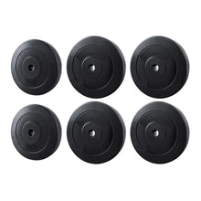 Set of six black weight plates with 5kg and 10kg markings for gym or home fitness