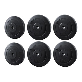 Set of six black weight plates with 5kg and 10kg markings for gym or home fitness