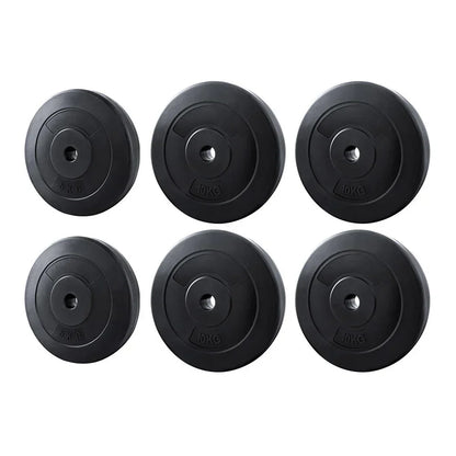 Set of six black weight plates with 5kg and 10kg markings for gym or home fitness