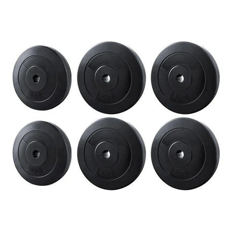 Set of six black weight plates with 5kg and 10kg markings for gym or home fitness