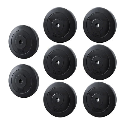 Set of eight black weight plates, 5kg and 10kg, for home gym or barbell training