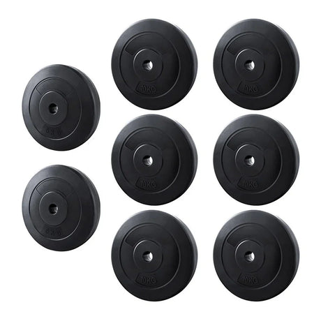 Set of eight black weight plates, 5kg and 10kg, for home gym or barbell training