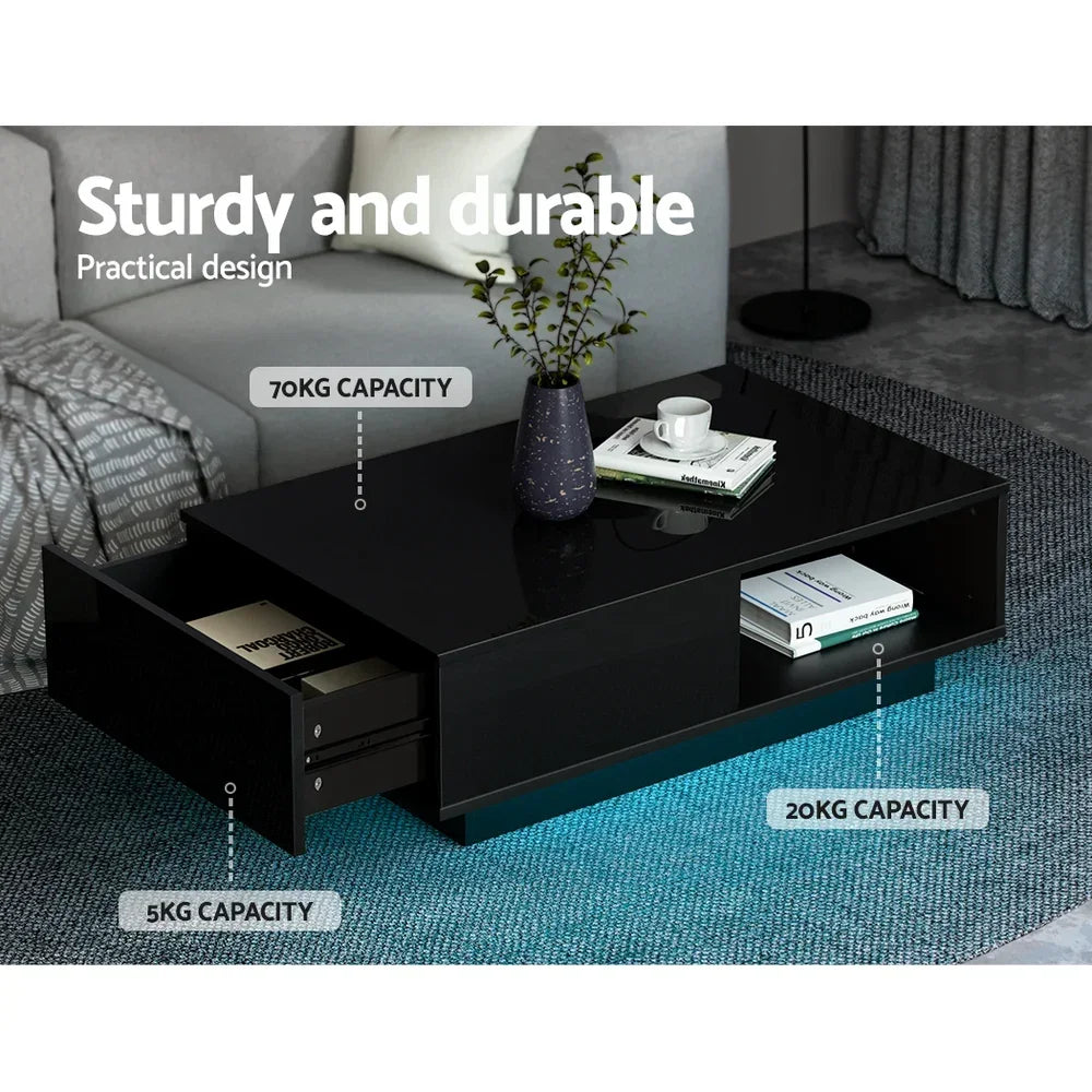 Black coffee table with storage shelves and drawer, 70kg capacity, modern living room furniture.