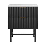 Modern black bedside table with gold handles and white marble top, two drawers, ribbed front design