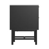 Black freestanding cabinet with white countertop and metal legs, front view