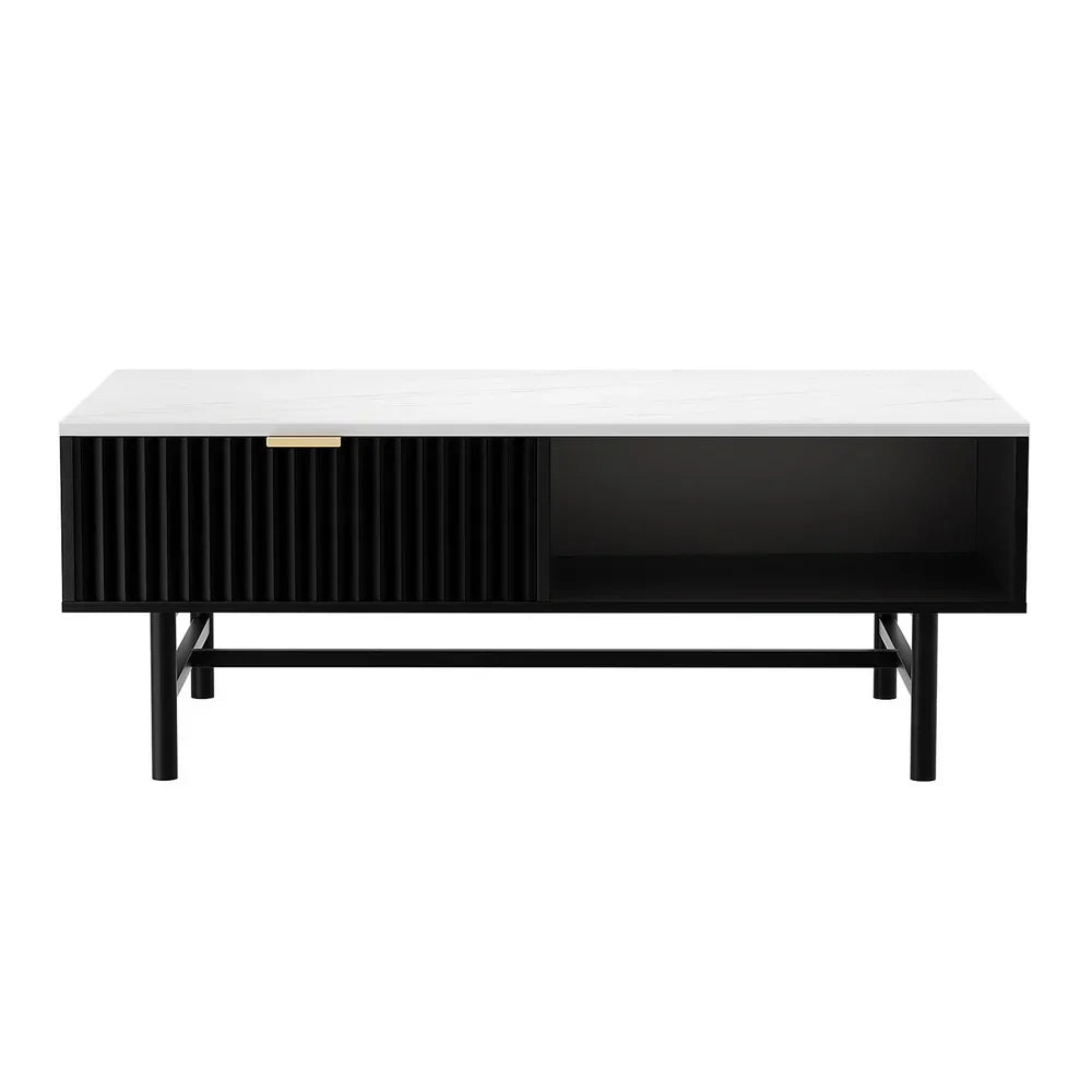 Modern black coffee table with white top, one slatted door and open storage shelf