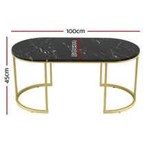 Oval black marble coffee table with gold metal frame, 100cm length, 50cm width, 45cm height.