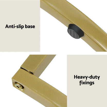 Gold metal frame with anti-slip base and heavy-duty fixings, close-up view