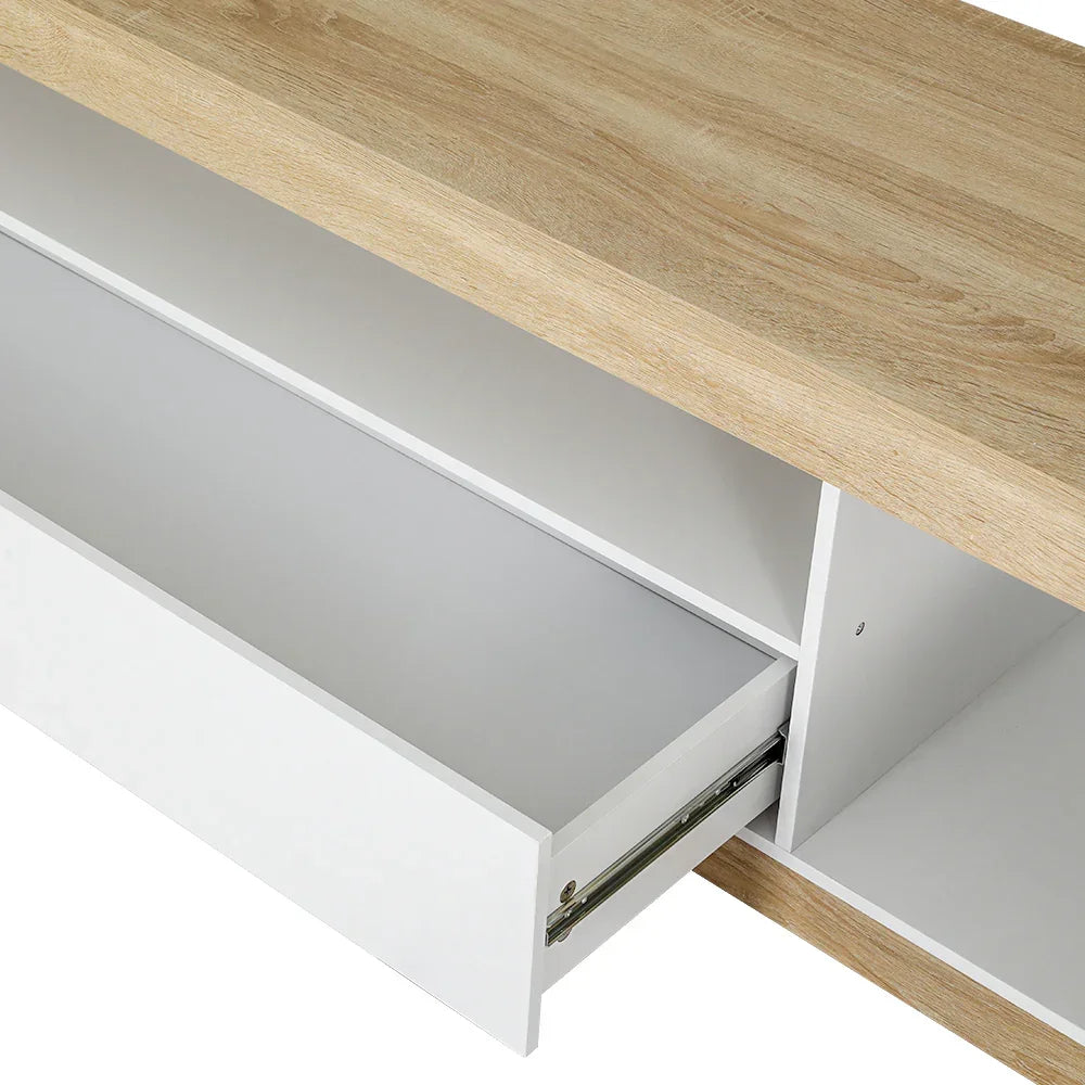Modern TV unit with open storage shelf and white pull-out drawer, wood finish top