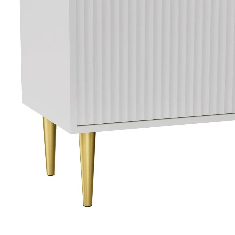 White cabinet with gold metal legs and vertical groove detail