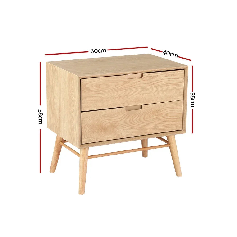 Light wood bedside table with two drawers, angled legs, and dimensions labeled in centimeters.