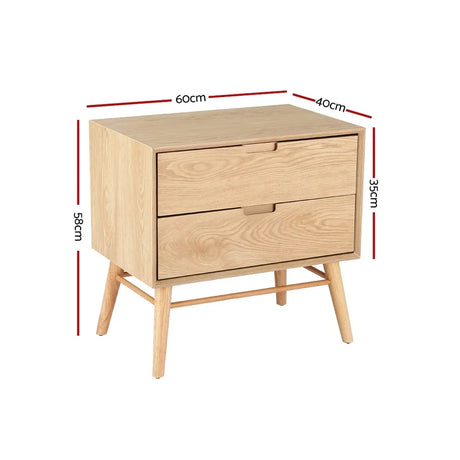 Light wood bedside table with two drawers, angled legs, and dimensions labeled in centimeters.
