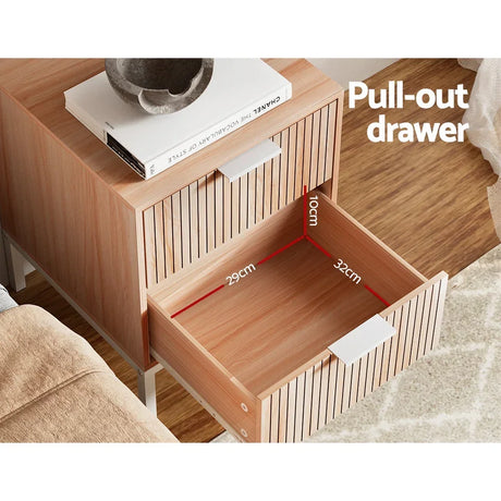 Wooden bedside table with pull-out drawer, showing dimensions 29x32x10cm.