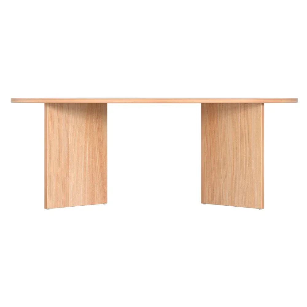 Modern rectangular light wood coffee table with panel legs, minimalist design