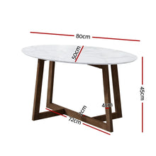 Oval white marble coffee table with wooden legs, measurements displayed in centimeters.