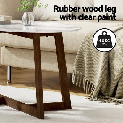 Round coffee table with marble top and rubber wood legs in modern living room, 60kg weight limit