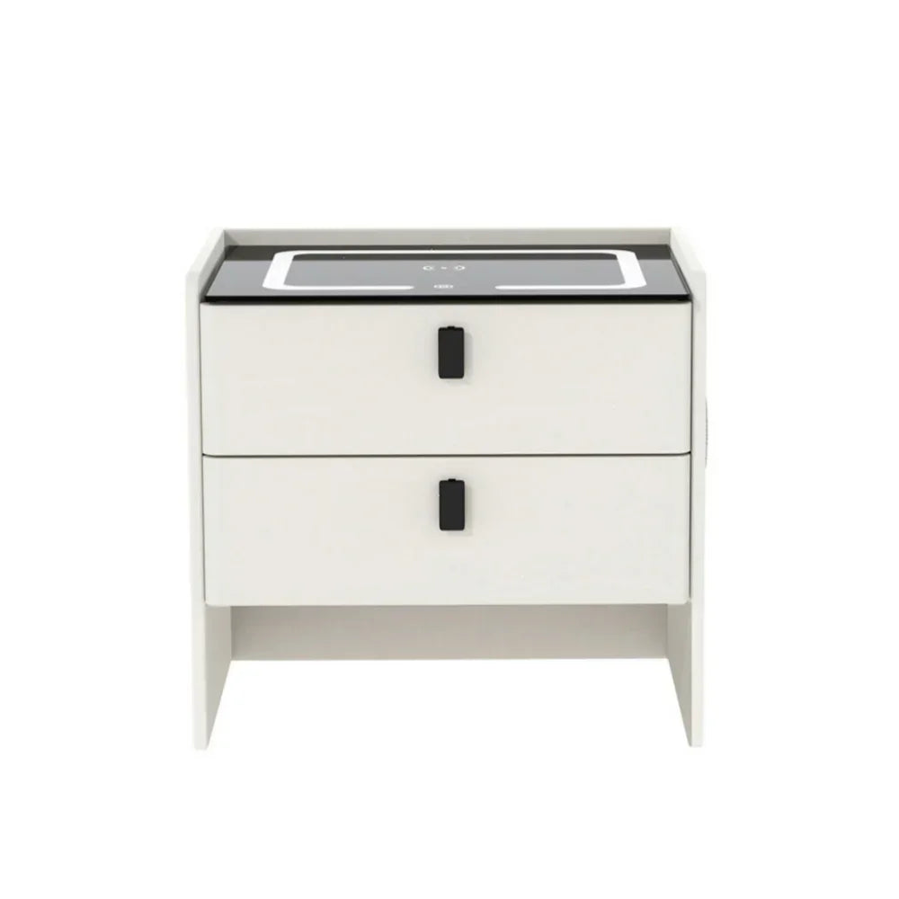Modern white bedside table with two drawers and black handles, minimalist furniture