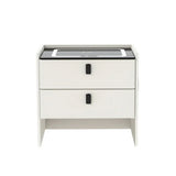 Modern white bedside table with two drawers and black handles, minimalist furniture