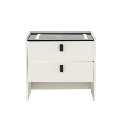 Modern white bedside table with two drawers and black handles, minimalist furniture