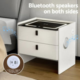 Modern white bedside table with Bluetooth speakers, LED lights, and USB type-C charging ports.