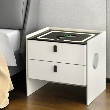 Modern white bedside table with two drawers, LED top, and wireless phone charging