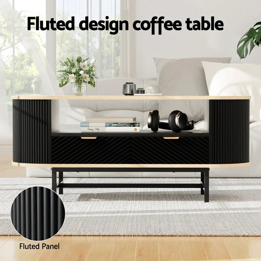 Modern black fluted design coffee table with storage, in a bright living room