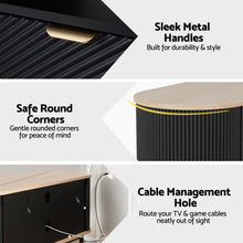Black ribbed cabinet with gold handles, rounded corners, and cable management hole for TV setup