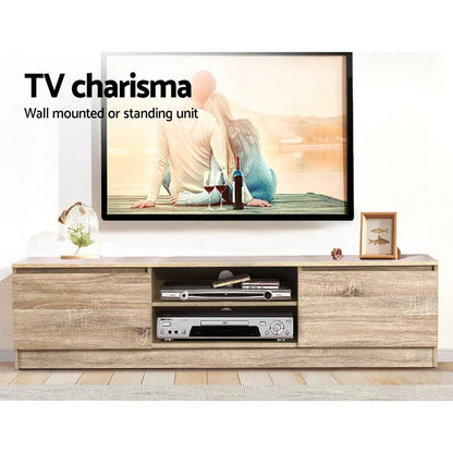 Modern wood TV cabinet with storage shelves and side doors in living room setting