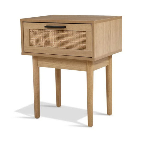 Modern wooden bedside table with cane drawer front and minimalist black handle