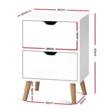 White two-drawer bedside table with wooden legs, showing detailed measurements in centimeters.