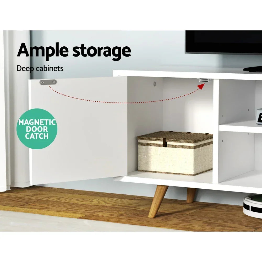 White TV cabinet with open door, deep storage, magnetic door catch, and wooden legs
