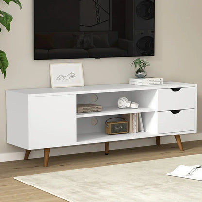 Modern white TV unit with drawers and shelves, wooden legs, in a living room setting