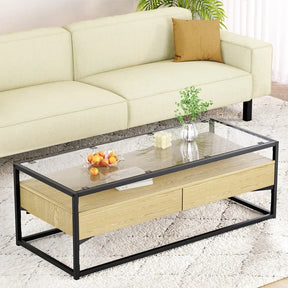 Modern glass and wood coffee table with black metal frame in a living room setting
