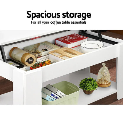 White lift-top coffee table with spacious storage compartments, books, dishes, and decor.