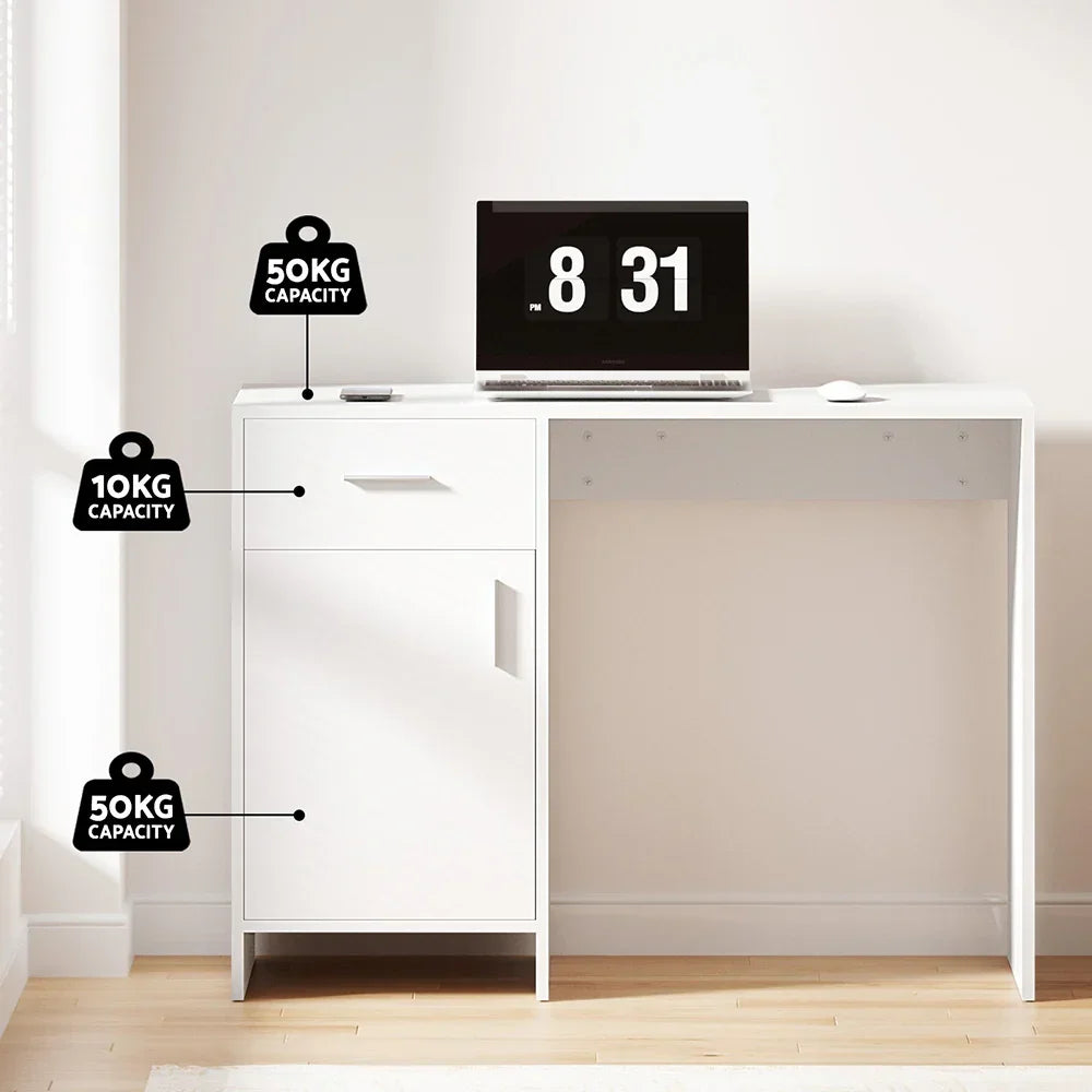 Modern white desk with drawer and cabinet, weight capacities labeled, laptop on top