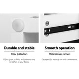 Close-up of white furniture showing round floor protector and metal drawer runner for stability and smooth operation.