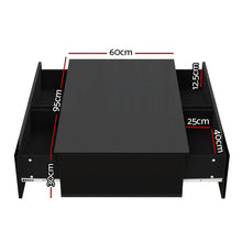 Black coffee table with open storage compartments and labeled dimensions in centimeters