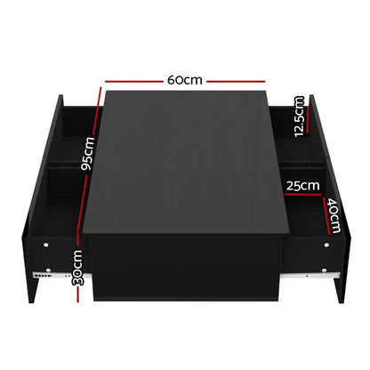 Black coffee table with open storage compartments and labeled dimensions in centimeters