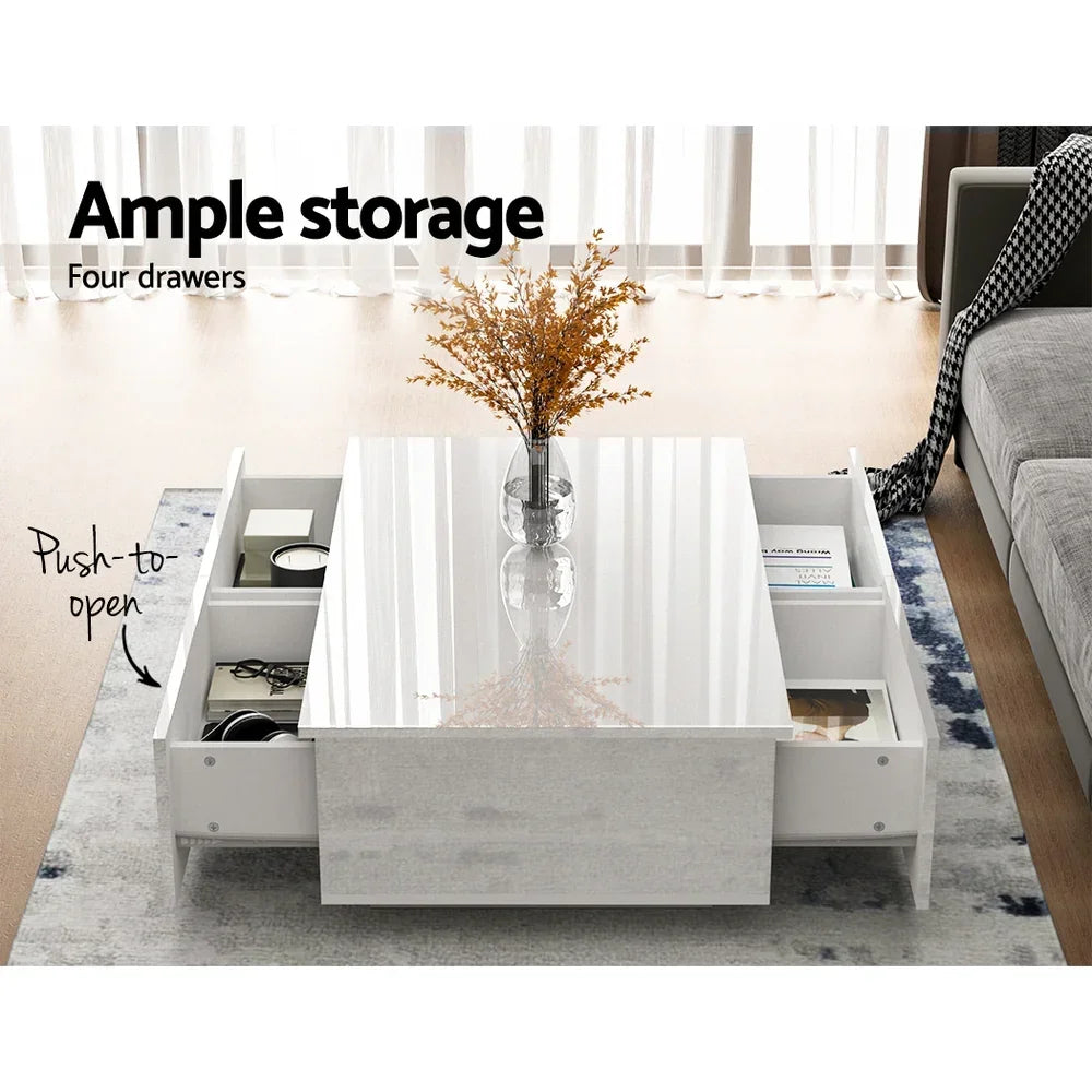 Modern white coffee table with push-to-open drawers and storage, decor in living room