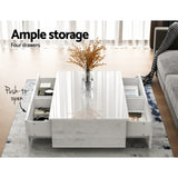 Modern white coffee table with push-to-open drawers and storage, decor in living room