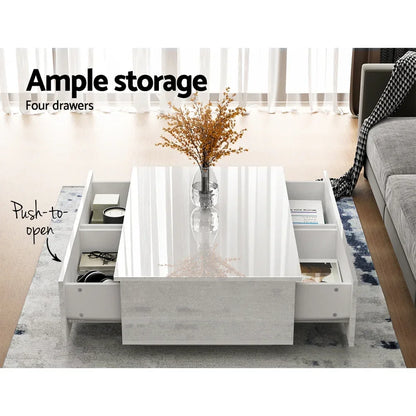Modern white coffee table with push-to-open drawers and storage, decor in living room