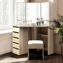 Corner wooden dressing table with mirror, drawers, stool, and makeup items by window
