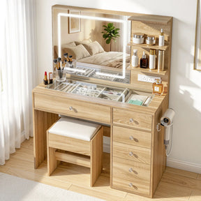 Modern wooden dressing table with LED mirror, stool, drawers, and organized makeup accessories
