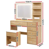 Wooden dressing table with LED mirror, drawers, shelves, stool, and size measurements shown.