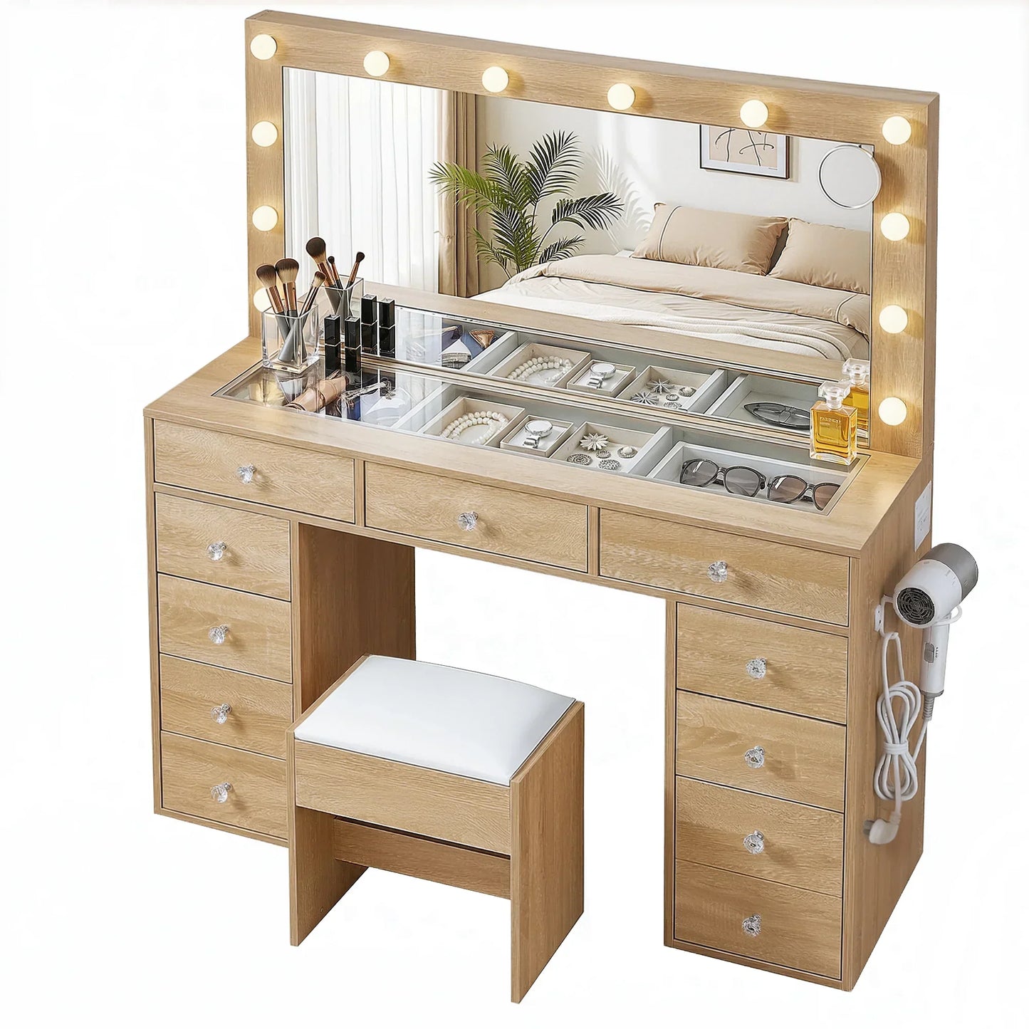 Wooden makeup vanity table with mirror lights, storage drawers, stool, and beauty accessories