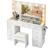 White vanity dressing table with lighted mirror, storage drawers, and matching cushioned stool