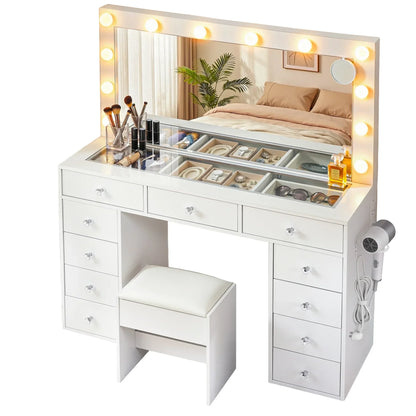 White vanity dressing table with lighted mirror, storage drawers, and matching cushioned stool